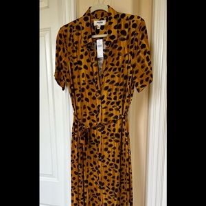 Maxi length button down dress with matching sash/belt. Lightweight. Never worn.
